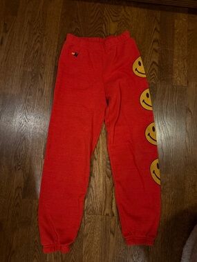 Aviator Nation Red Sweatpants with Yellow Smiley Graphics